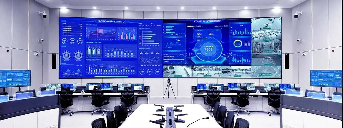 Security operations room with monitoring screens and analyst workstations
